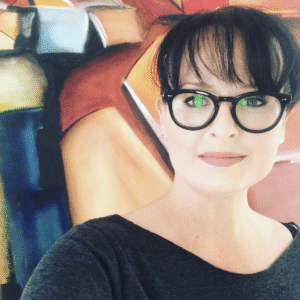 Andrea Cruz, fused glass dichroic jewelry instructor.